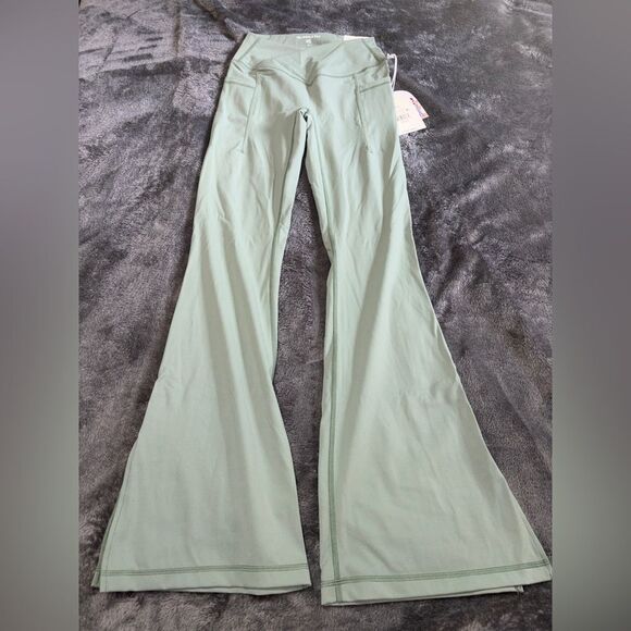 Nwt XS green logilates crisscross flare pants super soft material - Picture 1 of 6